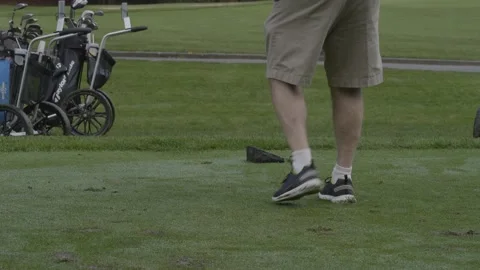 Golf. Player hitting ball. Low angle. Video stock 142600626