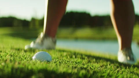 Golf Player hitting the Golf Ball on the course Stock Footage 264157547