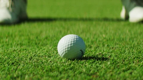 Golf Player hitting the Golf Ball on the grass Stock Footage 264158246