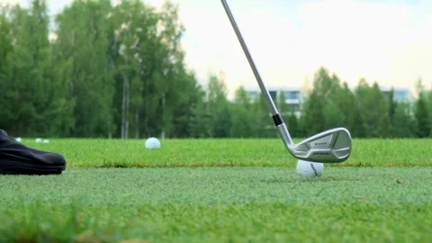 Golf Player Hitting Golf Ball in Slow Motion Video stock 282474980