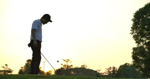 Golf player juggles a ball, using golf club. 스톡 동영상 149737323