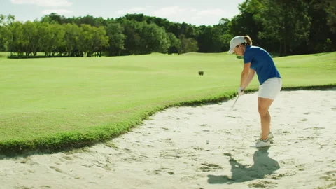 Golf player stuck in a bunker Stock Footage 264157249