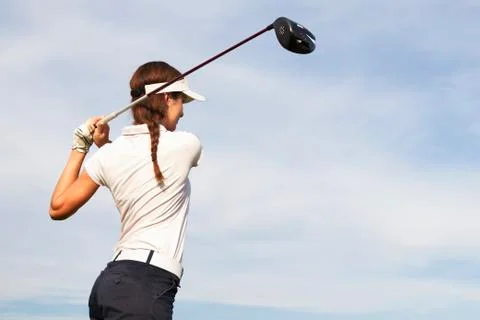 Golf player teeing off Foto stock