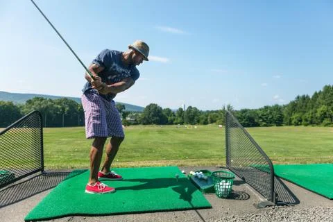 Golf Practice at the Driving Range Stock Photos