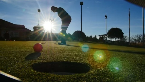 GOLF PUTT FALLING IN CUP Stock Footage 97523882