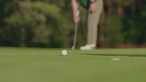 Golf putting training shot on grass Stock Footage 325479532