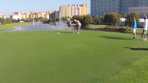 Golf putting for the win take  Stock Footage 64050828