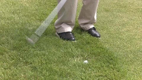 Golf shot out of short rough Stock Footage 80509519