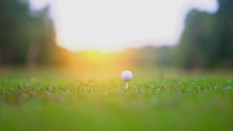 Golf slow motion golfer hitting golf ball in tee off in beautiful golf course Stock Footage 91394357