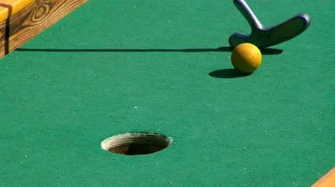 Golf stick and ball on green grass . Stock Footage 24000478