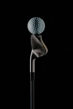 Golf sticks and golf balls Stock Photos