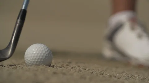 Golf swing in the sand Stock Footage 96012048