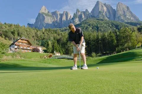 Golfclub St.Vigil Seis, Kastelruth, with Dolomite Mountains in background, Italy Stock Photos