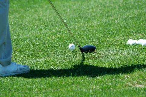 Golfer addressing the ball Stock-Fotos