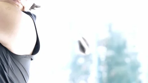 Golfer with Cap Making a Golf Swing Stock Footage 201061270