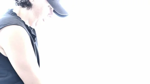 Golfer with Cap Making a Golf Swing Vídeos de archivo 201061322