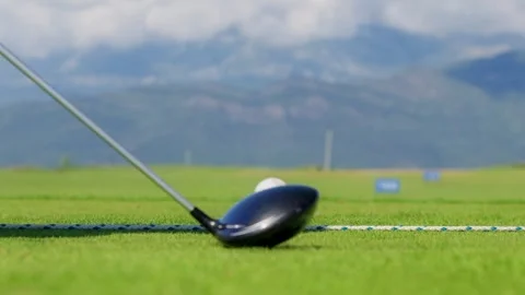 Golfer driver on tee with 100 and 150 markers Видео 329413252
