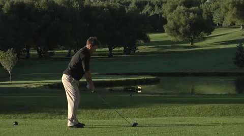 Golfer drives ball. Video stock 46594242