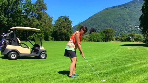 Golfer on the Golf Course with Driver and Golf Cart 動画素材 112120687