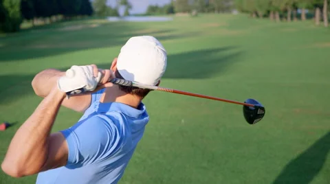 Golfer on golf course - swing - jib shot Stock Footage 41471138