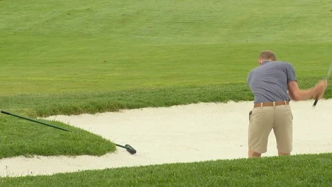 Golfer hits out of sand bunker Stock Footage 74243003