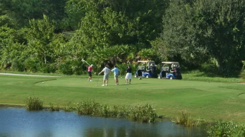 Golfer Hitting Ball at Golf Course Wide, 4K Stock Footage 55904093