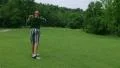 Golfer Hitting Ball With Iron HD Footage