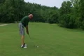 Golfer Hitting Ball With Iron Footage