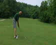Golfer Hitting Ball With Iron SD Footage
