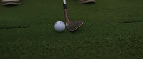 Golfer Hitting Ball on Practice Range with Wedge Stock Footage 242379237