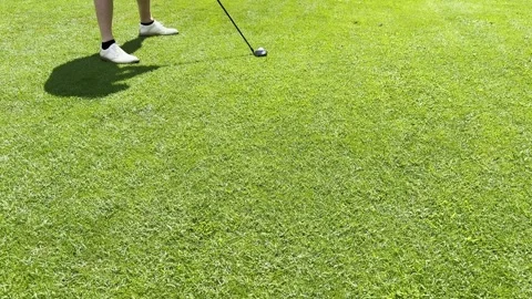 Golfer Hitting the Golf Ball with 3 Wood on the Fairway Stockbeeldmateriaal 245266789