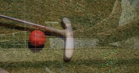 Golfer lining up red ball on green, showing floating data charts for golf Stock Footage 307452526