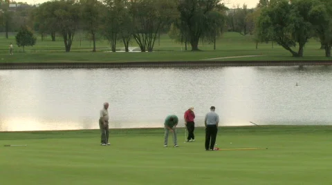 Golfer Making Putt Stock Footage 279531