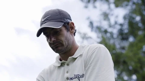 Golfer performing a golf swing in slow motion Stock Footage 71544577