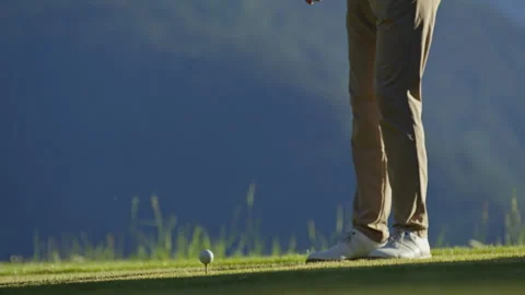 Golfer performing practice swing before tee shot Stock-Footage 337029947