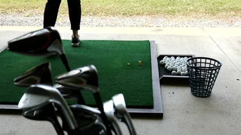 Golfer Practice Golf Swing in Driving Range and with a Golf Bag with Golf Club Stock-Footage 161220682