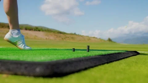 Golfer prepares to strike on coastal range in Montenegro, Adriatic Видео 329413083