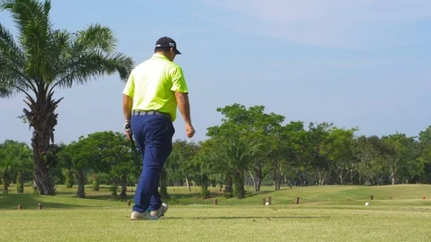 GOLFER PUT BALL Stock Footage 115627930
