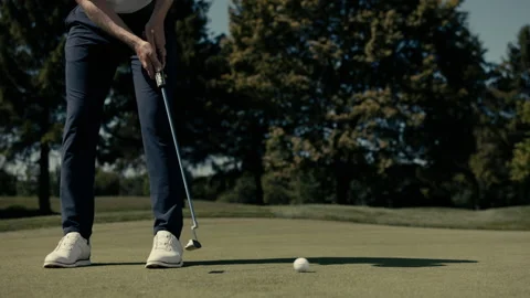 Golfer is putting the ball Video stock 220293127