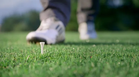 Golfer putting a ball on a tee Stock Footage 41470311