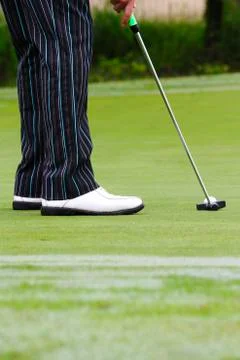Golfer putting Foto stock
