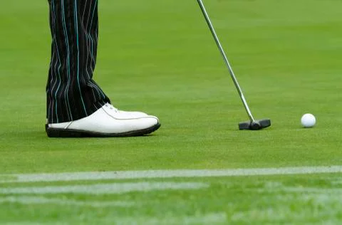 Golfer putting Stock Photos