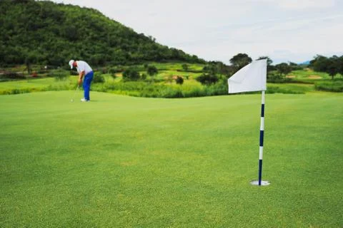 Golfer putting Stock Photos