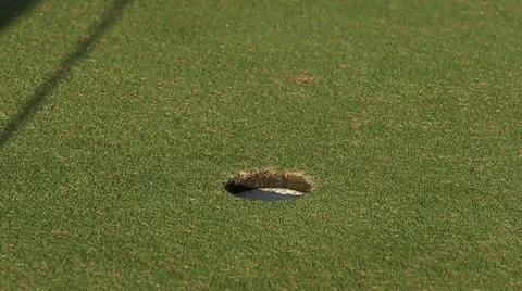 Golfer putting, selective focus on golf ball Stock-Footage 66372373