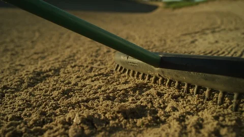 Golfer Raking a Bunker Stock Footage 108335388