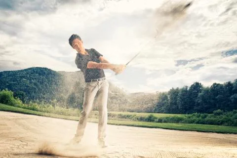 Golfer in sand trap. Foto stock
