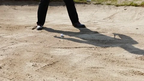 Golfer with Shadow Preparation Golf Swing to Hitting Golf Ball in Sand Trap Stockbeeldmateriaal 191942429