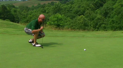 Golfer Sinks Putt 04 Stock Footage 665329