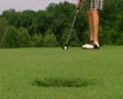 Golfer Sinks Putt 05 SD Footage