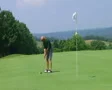 Golfer Sinks Putt SD Footage